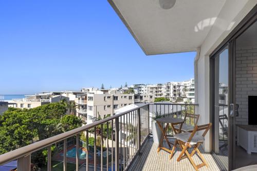 a balcony with a view of a city at Ashwood on Kings- Kings Beach in Caloundra