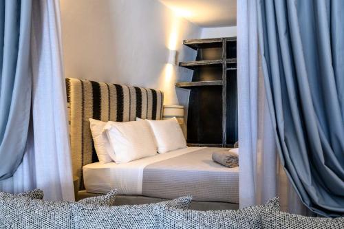 Postel nebo postele na pokoji v ubytování Deep Earth Villas