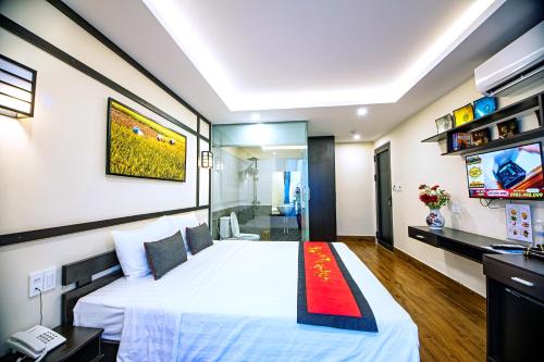 Postel nebo postele na pokoji v ubytování Hoi An Riverland Villa - Hoi An Center