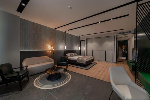 Letto o letti in una camera di Dostyk Business Hotel