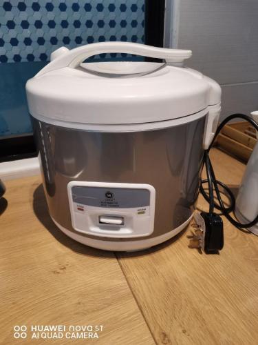a slow cooker sitting on top of a table at Platino Aparment @ Paradigm Mall in Johor Bahru