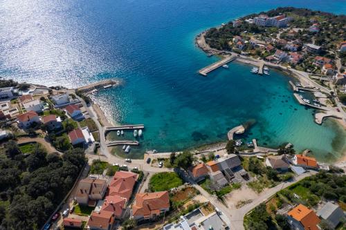 an aerial view of a small island in the water at Apartments and rooms LJUBICA in Lun