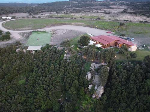 an aerial view of a large house with a red roof at Casa Su Soli Sardu II - Sea View in La Ciaccia
