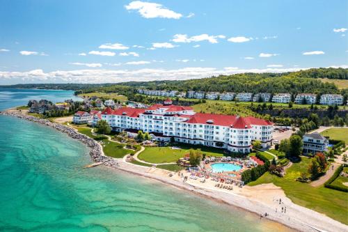 an aerial view of a resort on the beach at Inn at Bay Harbor, Autograph Collection in Petoskey