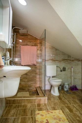 a bathroom with a sink and a toilet at Gurman in Strumica