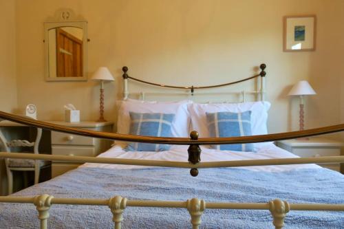 The Tallet - converted three bed stable - no children under 8にあるベッド