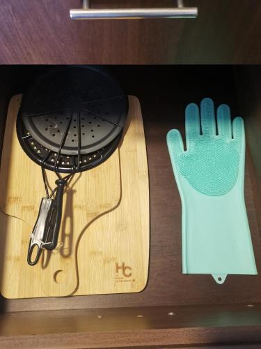a pair of gloves sitting on top of a table at La Lunar un espacio ideal para trabajar y conocer Medellín in Medellín