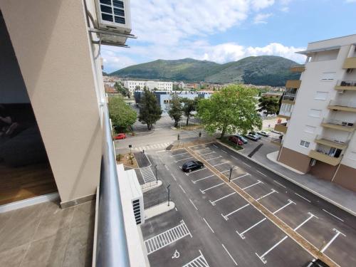 a view of a street from a balcony of a building at Apartman Pike centar in Trebinje