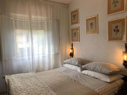 Säng eller sängar i ett rum på Villino a 200 mt dal mare