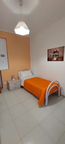 Posteľ alebo postele v izbe v ubytovaní B&b del corso
