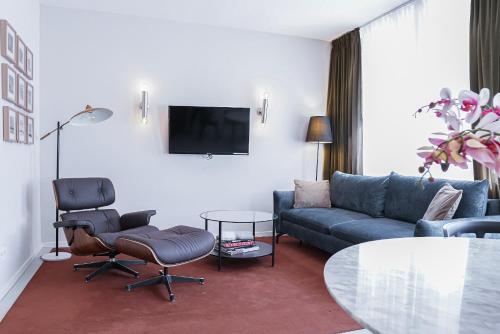 Televiisor ja/või meelelahutuskeskus majutusasutuses HeyMi Apartments Mondschein