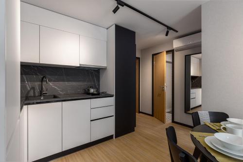 ครัวหรือมุมครัวของ Balcia Residence
