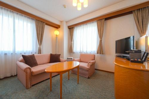 TV a/nebo společenská místnost v ubytování Ise Pearl Pier Hotel