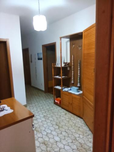 a bathroom with a sink and a mirror in a room at Apartmani Mislav in Slatine
