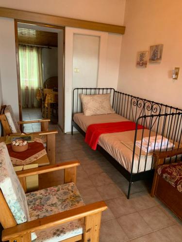Ένα ή περισσότερα κρεβάτια σε δωμάτιο στο ambelos view