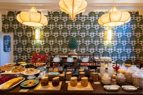 a buffet of food on a table in a restaurant at Hotel Villa Favorita in Noto