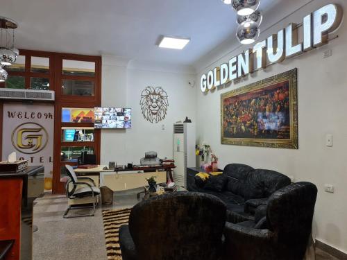 TV a/nebo společenská místnost v ubytování Tulip 6 of October Hotel