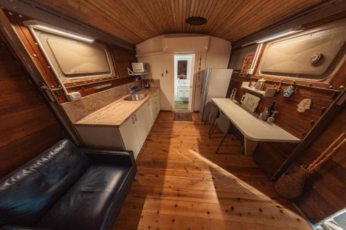 an overhead view of a kitchen in a tiny house at Lisa's Farm Place in Rishon LeẔiyyon