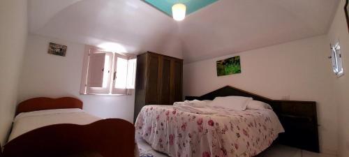 Кровать или кровати в номере L'orchidea amalfi coast