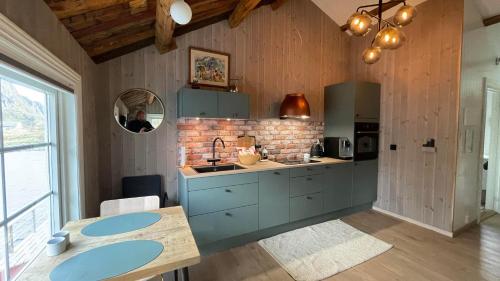 Una cocina o cocineta en Rostad Retro Rorbuer