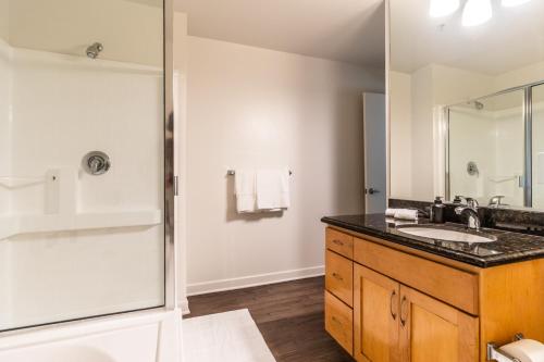 a bathroom with a sink and a shower at Spacious 2BR Near Santa Monica Beach, Walk Everywhere! in Los Angeles