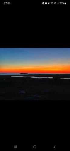 a view of the sky from an airplane at Loch an Eilean Pod Isle of South Uist in Pollachar