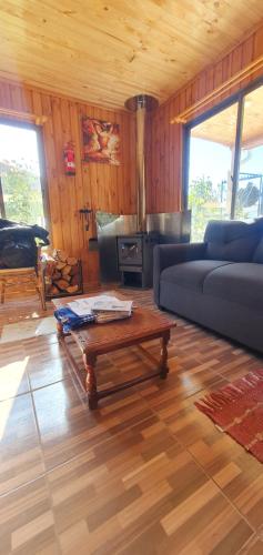 Un lugar para sentarse en Alojamiento Machicura