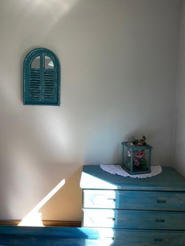 a room with a dresser with a window on the wall at Agroturystyka Oaza Ciszy i Spokoju in Międzychód