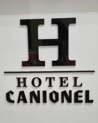 Certificado, premio, señal o documento que está expuesto en Hotel Canionel