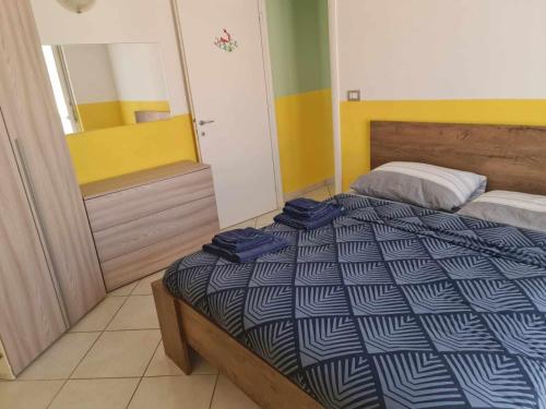 Ένα ή περισσότερα κρεβάτια σε δωμάτιο στο Appartamento Centro nel verde