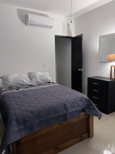 Postel nebo postele na pokoji v ubytování Departamento 102
