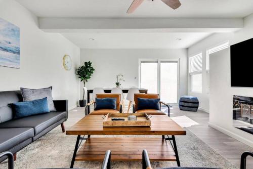 a living room with a couch and a table at Near Downtown l Peaceful l Modern l Kids Room in Atascadero