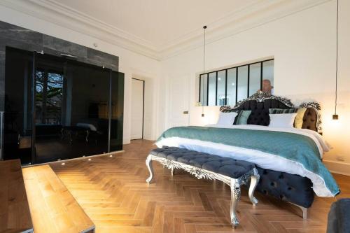 Posteľ alebo postele v izbe v ubytovaní L'appartement du château