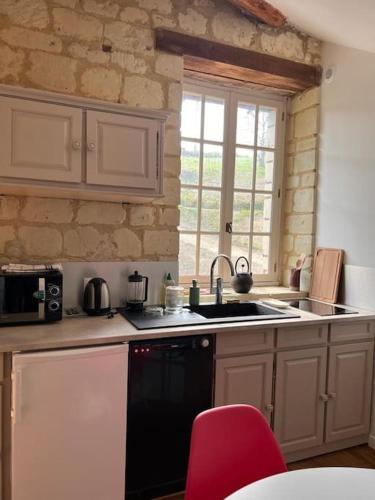 Η κουζίνα ή μικρή κουζίνα στο Gîte de Frau