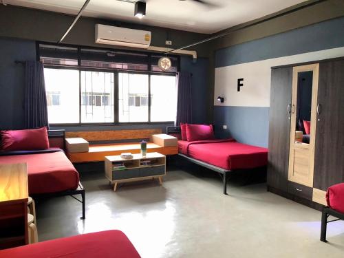 Postel nebo postele na pokoji v ubytování Amity Poshtel