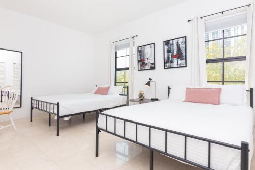 Кровать или кровати в номере Miami Downtown Modern Apartment - 5 minutes to Wynwood - 10 minutes to South Beach