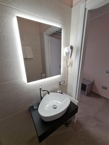 Salle de bains dans l'établissement Le Anfore di Nora Domo