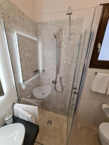 Salle de bains dans l'établissement Le Anfore di Nora Domo