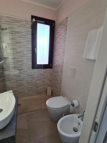 Salle de bains dans l'établissement Le Anfore di Nora Domo