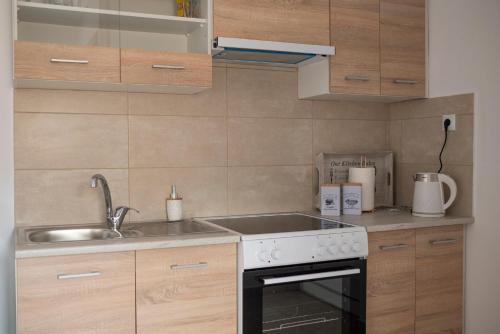 A kitchen or kitchenette at traditional suburbs maisonette