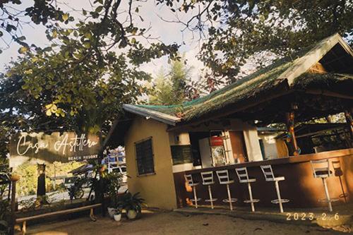 a building with a sign in front of it at Casa Astillero - Calatagan Batangas Private Resort in Calatagan