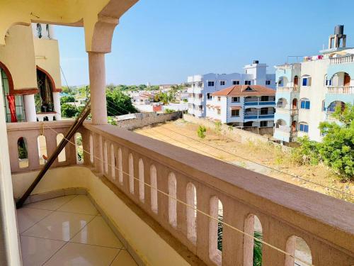a balcony with a view of the city at Lux suites Startup Apartments in Mombasa
