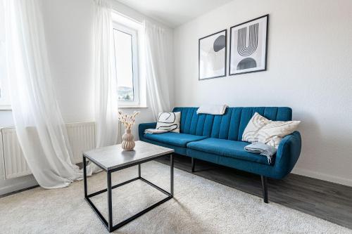 Un lugar para sentarse en Modernes Apartment am Campus - Parken - Smart-TV - Kaffeevollautomat