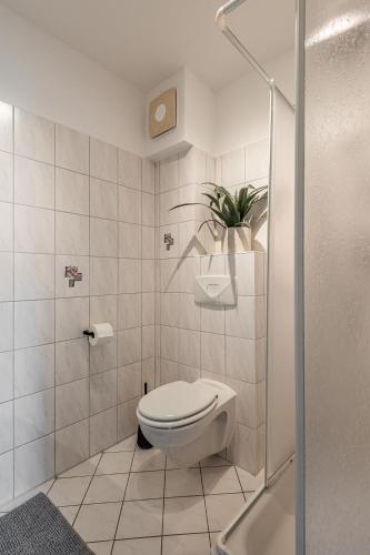 Un baño de Modernes Apartment am Campus - Parken - Smart-TV - Kaffeevollautomat