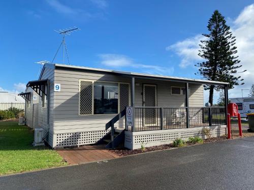 a mobile home on the side of a road at Christies Beach Tourist Park in Christies Beach