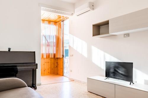 Телевизор и/или развлекательный центр в Casa Ferraro - Casa Vacanza in Sorrento Coast
