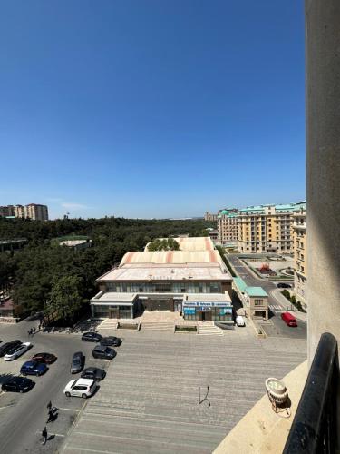 a view of a parking lot with a large building at Luxury seaside home in Sumqayyt