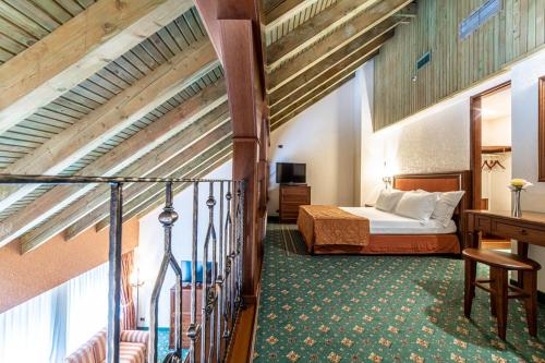 Postel nebo postele na pokoji v ubytování Lux Garden Hotel