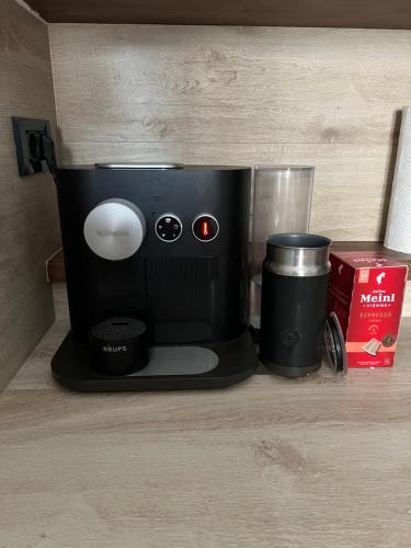 a coffee maker sitting on top of a counter at Romantic apartments in Šibenik