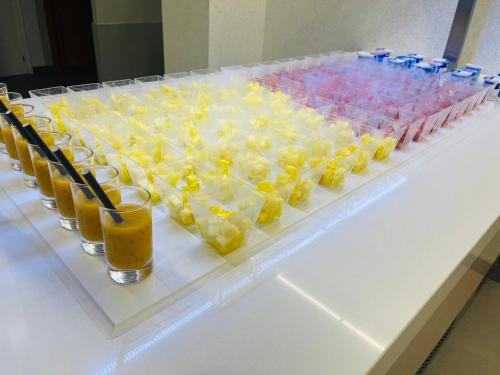 a table with a tray of drinks on it at Hotel Susuqui in Sanxenxo